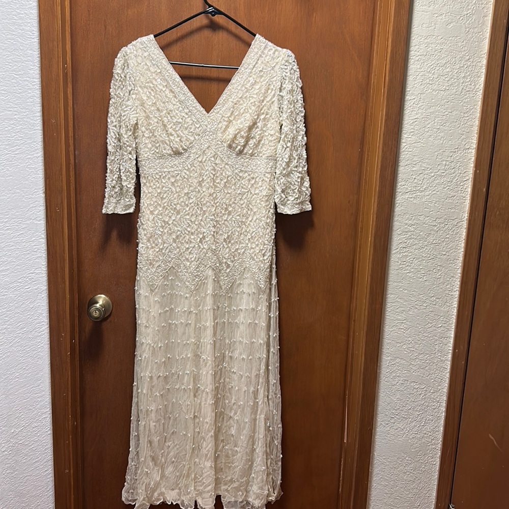 Beautiful beaded mother of the bride dress.